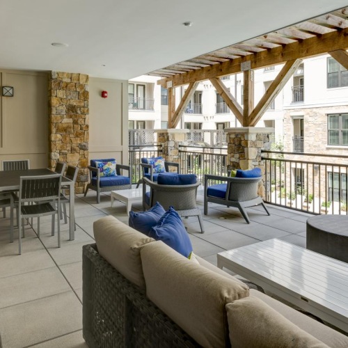 a living room with a stone patio