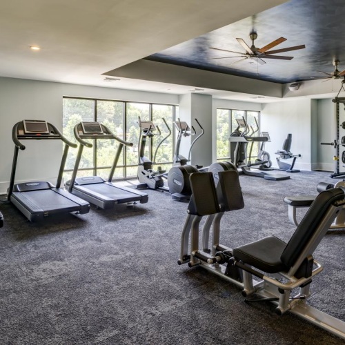 a room with treadmills and treadmills