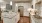a kitchen with white cabinets
