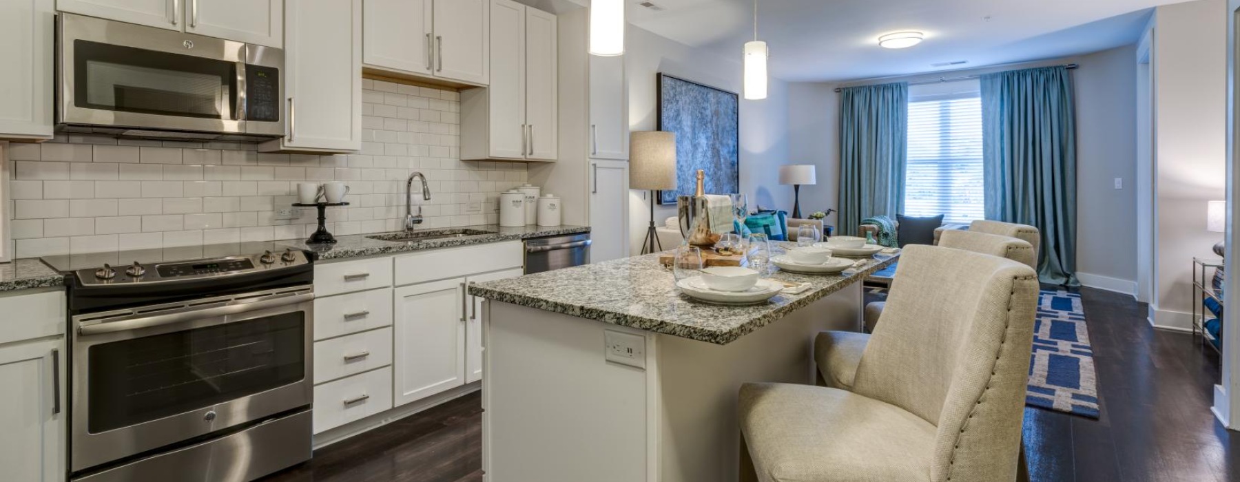 a kitchen with white cabinets