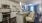 a kitchen with white cabinets