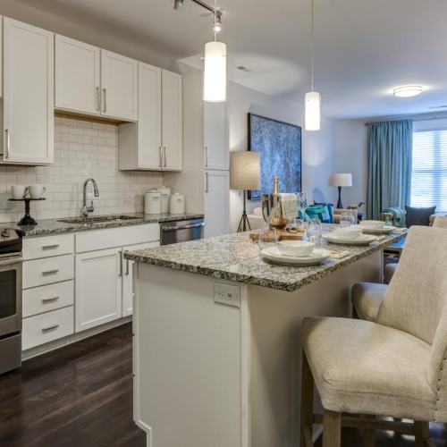 a kitchen with white cabinets